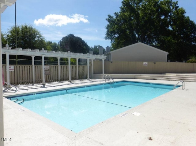 7771 Falcon Rest Cir, Raleigh, NC 27615 - community pool with a pergola