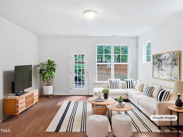 3010 Berkeley Springs Pl, Raleigh, NC 27616 - living area featuring wood finished floors and baseboards