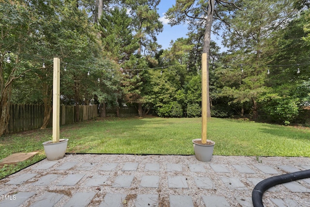 2510 Springhill Ave, Raleigh, NC 27603 - fenced backyard featuring a patio