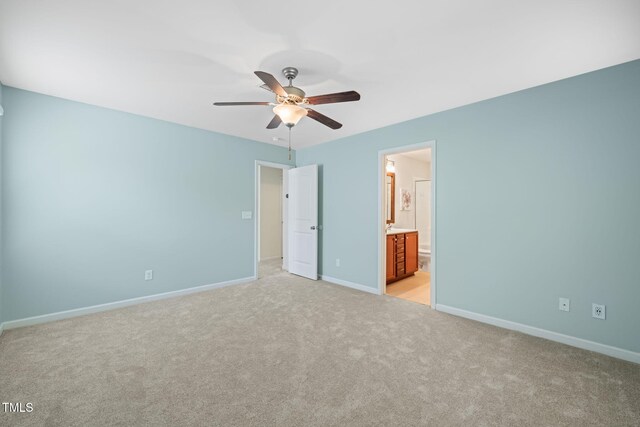 120 Holly Berry Ln, Durham, NC 27703 - unfurnished bedroom with light colored carpet, ensuite bath, and ceiling fan