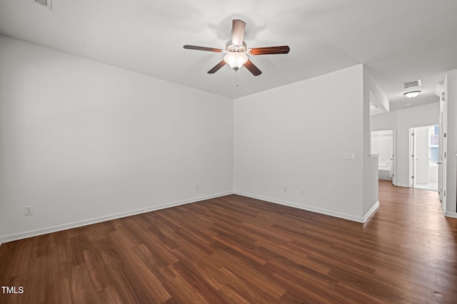 120 Holly Berry Ln, Durham, NC 27703 - spare room featuring a ceiling fan and dark wood-type flooring