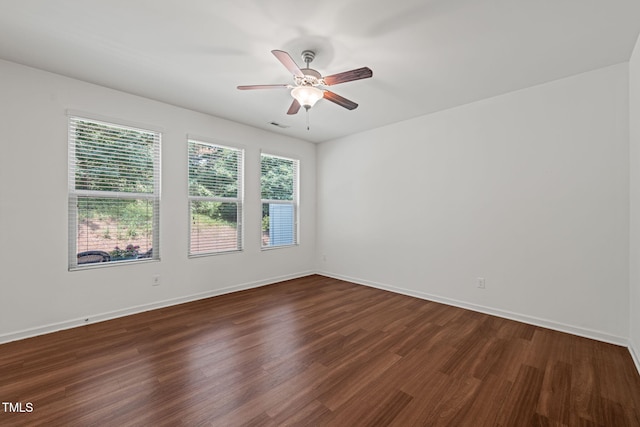 120 Holly Berry Ln, Durham, NC 27703 - unfurnished room featuring dark wood-style flooring and ceiling fan