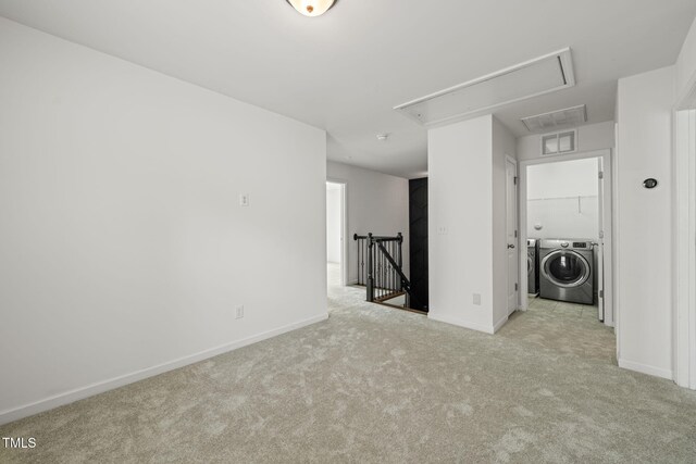 120 Holly Berry Ln, Durham, NC 27703 - empty room featuring attic access, washer and clothes dryer, and carpet floors