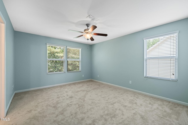 120 Holly Berry Ln, Durham, NC 27703 - unfurnished room featuring healthy amount of natural light, ceiling fan, and carpet floors