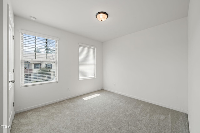120 Holly Berry Ln, Durham, NC 27703 - unfurnished room with carpet and a smoke detector