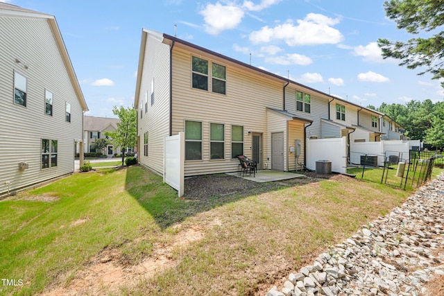 120 Holly Berry Ln, Durham, NC 27703 - back of house featuring a patio area and a residential view