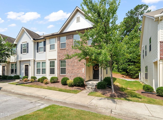 120 Holly Berry Ln, Durham, NC 27703 - multi unit property with brick siding and board and batten siding
