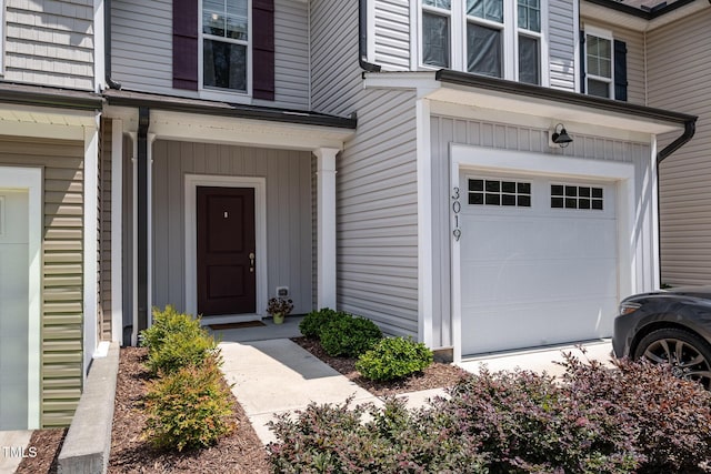 3019 Newfields Pl, Durham, NC 27703 - property entrance featuring an attached garage
