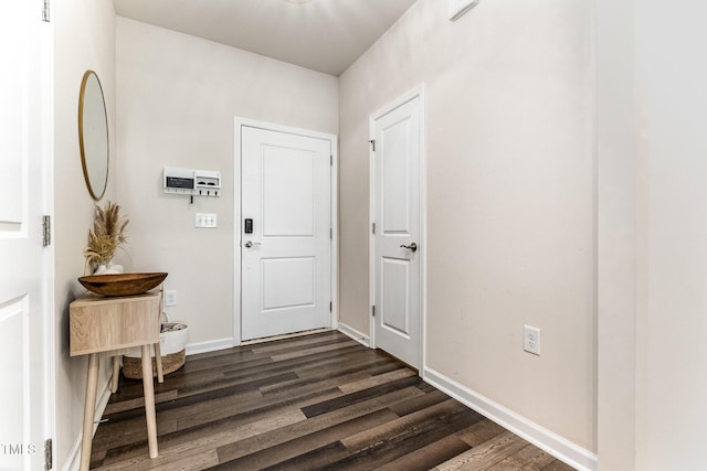 3019 Newfields Pl, Durham, NC 27703 - entrance foyer with dark wood finished floors and baseboards