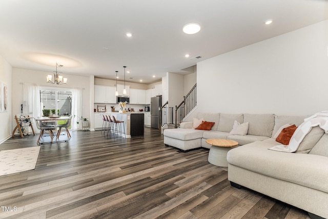 3019 Newfields Pl, Durham, NC 27703 - living area featuring a chandelier, dark wood finished floors, stairway, and recessed lighting