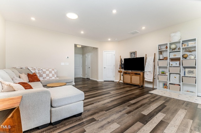 3019 Newfields Pl, Durham, NC 27703 - living room with dark wood finished floors and recessed lighting