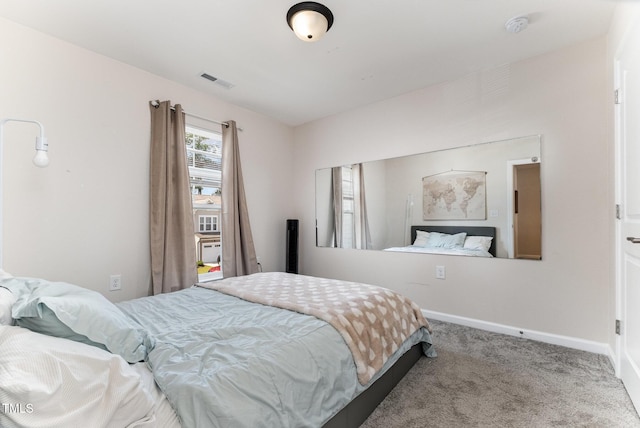 3019 Newfields Pl, Durham, NC 27703 - carpeted bedroom featuring baseboards