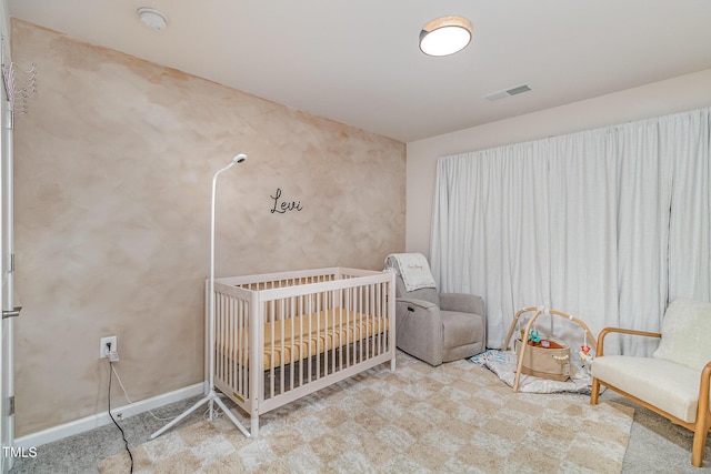 3019 Newfields Pl, Durham, NC 27703 - bedroom with a nursery area and carpet flooring