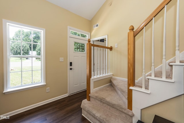 10 Biltmore Pl, Durham, NC 27712 - entryway with stairway, plenty of natural light, dark wood-style flooring, and vaulted ceiling