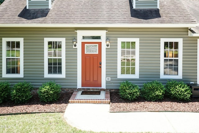 10 Biltmore Pl, Durham, NC 27712 - doorway to property featuring roof with shingles