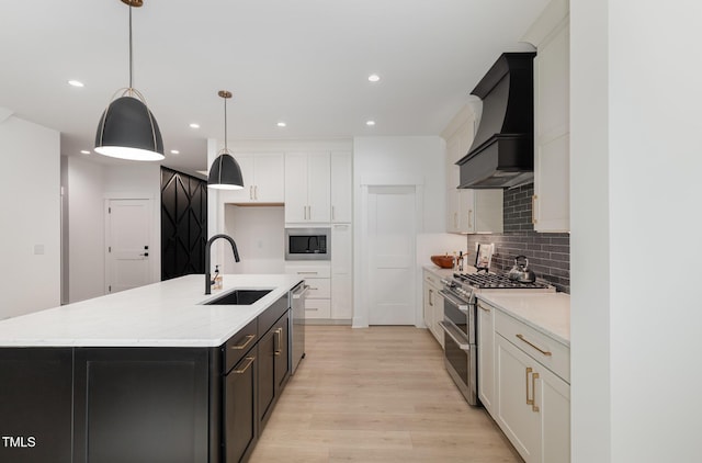 3714 Ode Turner Rd, Hillsborough, NC 27278 - kitchen with appliances with stainless steel finishes, custom range hood, white cabinetry, tasteful backsplash, and light wood-style floors