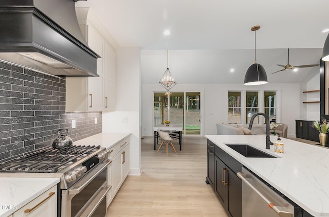 3714 Ode Turner Rd, Hillsborough, NC 27278 - kitchen with appliances with stainless steel finishes, premium range hood, backsplash, white cabinetry, and recessed lighting