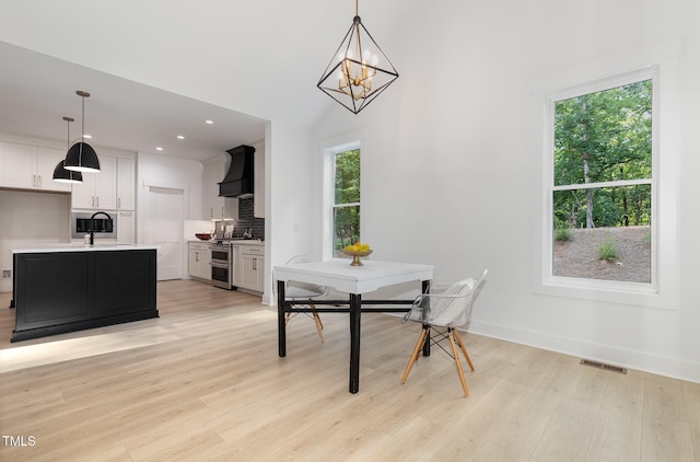 3714 Ode Turner Rd, Hillsborough, NC 27278 - dining space with plenty of natural light, light wood-style flooring, a chandelier, and recessed lighting