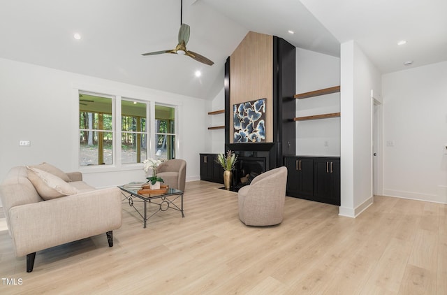 3714 Ode Turner Rd, Hillsborough, NC 27278 - living room with high vaulted ceiling, a ceiling fan, light wood finished floors, a fireplace, and recessed lighting