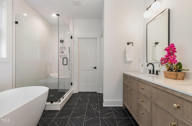 3714 Ode Turner Rd, Hillsborough, NC 27278 - full bathroom featuring marble look tiles, a soaking tub, a shower stall, and double vanity