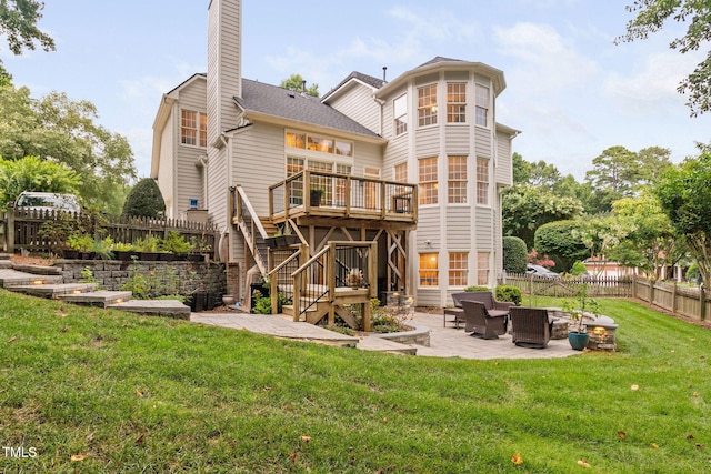 100 Beraneak Ln, Cary, NC 27519 - back of property with a patio, a wooden deck, a fenced backyard, stairway, and a chimney