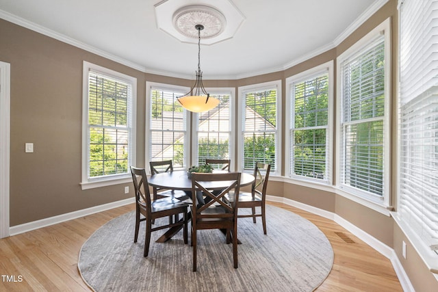 100 Beraneak Ln, Cary, NC 27519 - dining room with light wood finished floors and ornamental molding