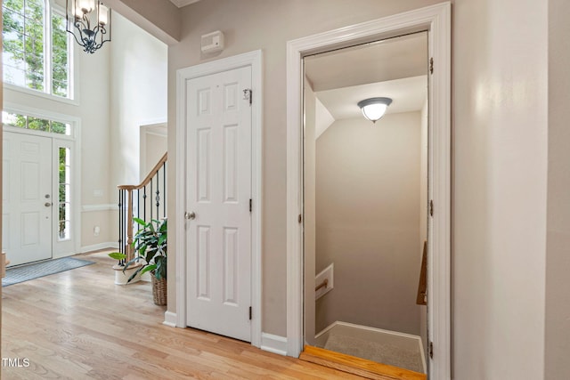 100 Beraneak Ln, Cary, NC 27519 - entryway with light wood-style flooring and stairs