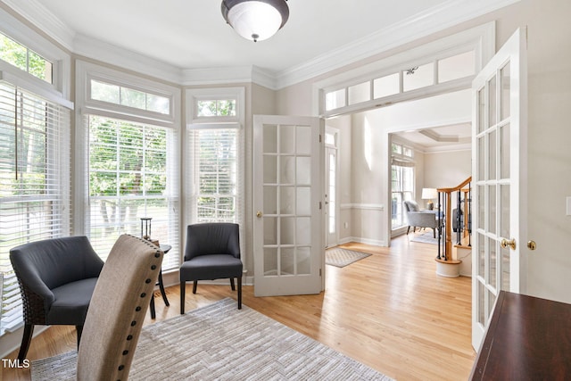 100 Beraneak Ln, Cary, NC 27519 - living area with french doors, light wood finished floors, and ornamental molding