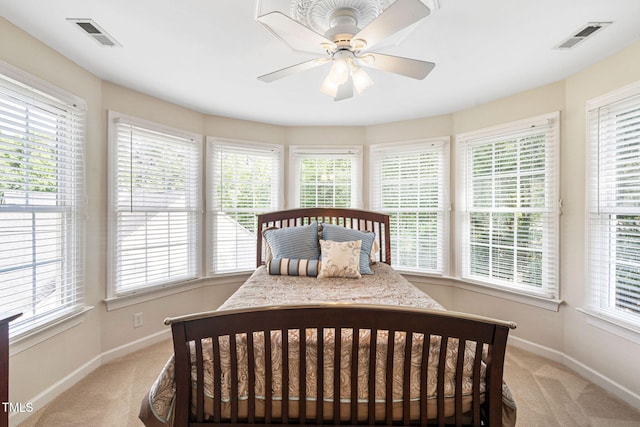 100 Beraneak Ln, Cary, NC 27519 - bedroom featuring light colored carpet, multiple windows, and ceiling fan