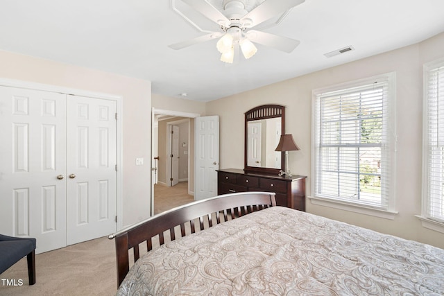 100 Beraneak Ln, Cary, NC 27519 - bedroom featuring light carpet, a closet, and a ceiling fan
