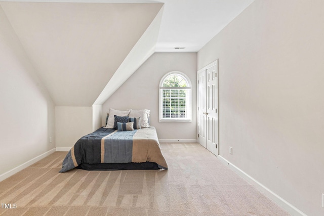 100 Beraneak Ln, Cary, NC 27519 - carpeted bedroom with lofted ceiling and baseboards