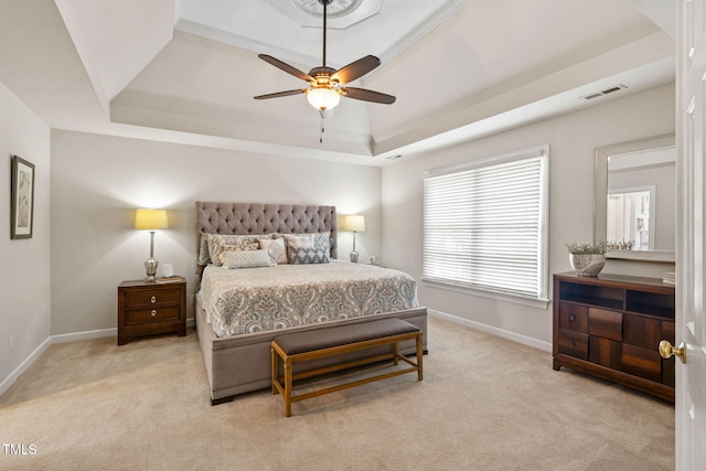 100 Beraneak Ln, Cary, NC 27519 - bedroom featuring a tray ceiling, light carpet, and ceiling fan