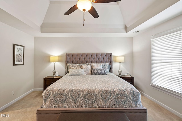 100 Beraneak Ln, Cary, NC 27519 - bedroom with light colored carpet, a tray ceiling, ceiling fan, and vaulted ceiling