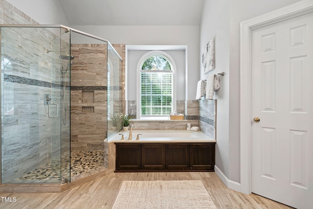 100 Beraneak Ln, Cary, NC 27519 - full bath with wood finished floors, a garden tub, and a shower stall