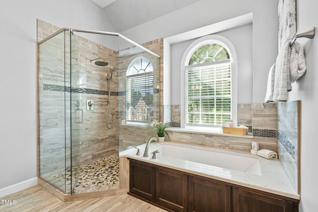 100 Beraneak Ln, Cary, NC 27519 - bathroom with a garden tub, a shower stall, and lofted ceiling
