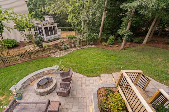 100 Beraneak Ln, Cary, NC 27519 - view of yard featuring a patio, an outdoor fire pit, and a sunroom