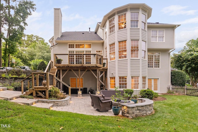 100 Beraneak Ln, Cary, NC 27519 - rear view of house with a wooden deck, a patio, stairway, a chimney, and an outdoor hangout area
