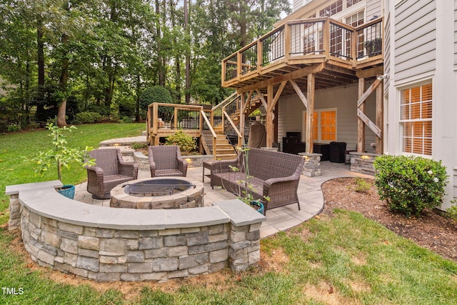100 Beraneak Ln, Cary, NC 27519 - view of patio with stairs, a deck, and an outdoor living space with a fire pit