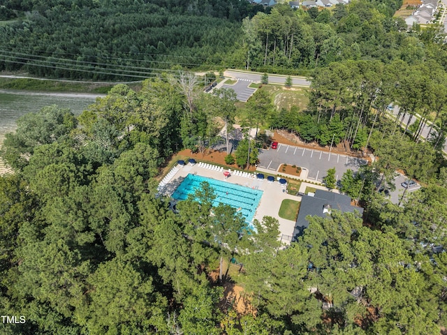 2307 Bethpage Dr, Fuquay Varina, NC 27526 - aerial view of property's location featuring a forest and a pool
