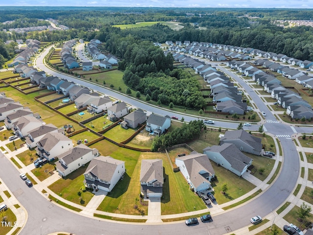 2307 Bethpage Dr, Fuquay Varina, NC 27526 - aerial view of residential area with a forest
