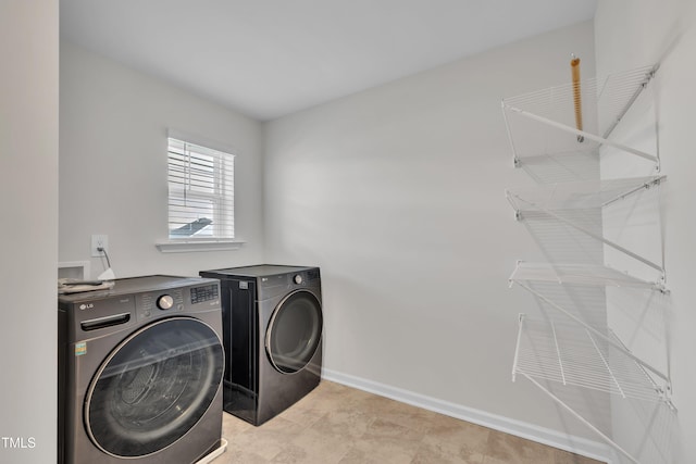 2307 Bethpage Dr, Fuquay Varina, NC 27526 - laundry room featuring independent washer and dryer and baseboards