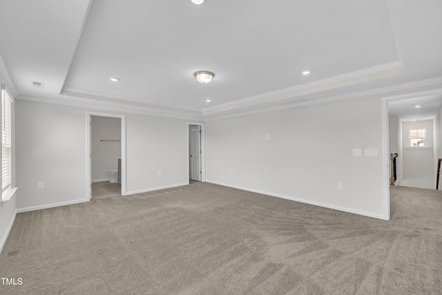 2307 Bethpage Dr, Fuquay Varina, NC 27526 - empty room with a tray ceiling, ornamental molding, recessed lighting, and carpet