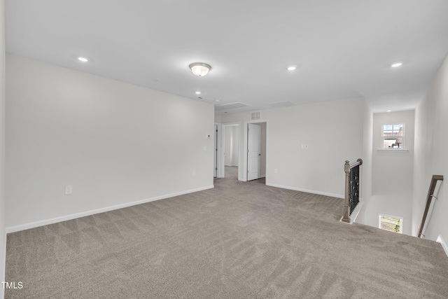 2307 Bethpage Dr, Fuquay Varina, NC 27526 - carpeted spare room featuring recessed lighting and attic access