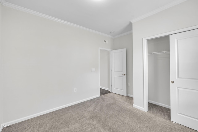 2307 Bethpage Dr, Fuquay Varina, NC 27526 - unfurnished bedroom featuring crown molding, carpet flooring, and a closet