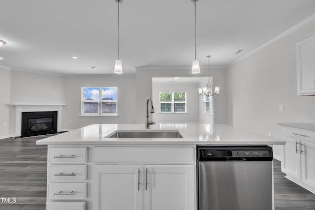 2307 Bethpage Dr, Fuquay Varina, NC 27526 - kitchen featuring stainless steel dishwasher, open floor plan, dark wood-style flooring, crown molding, and a glass covered fireplace