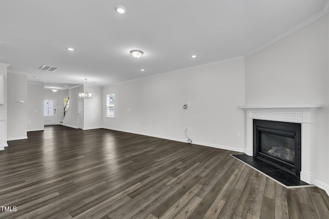 2307 Bethpage Dr, Fuquay Varina, NC 27526 - unfurnished living room with a glass covered fireplace, dark wood-style flooring, ornamental molding, recessed lighting, and a chandelier
