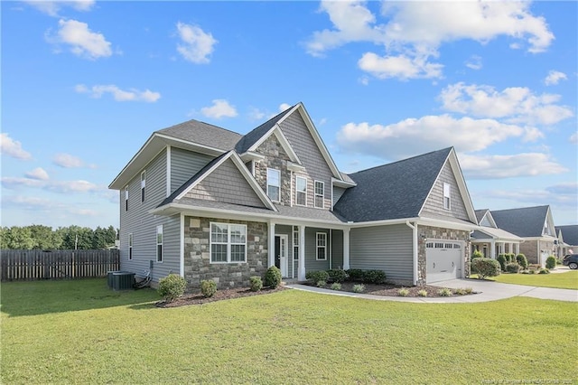 117 Kodiak Cir, Raeford, NC 28376 - craftsman inspired home featuring stone siding, driveway, a shingled roof, and a porch