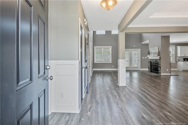 117 Kodiak Cir, Raeford, NC 28376 - foyer with a stone fireplace, wood finished floors, and ornamental molding