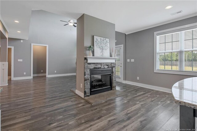 117 Kodiak Cir, Raeford, NC 28376 - living room featuring a fireplace, a ceiling fan, dark wood finished floors, recessed lighting, and ornamental molding