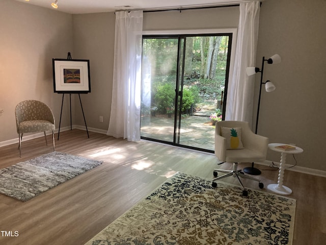 3082 Colony Rd Unit A, Durham, NC 27705 - living area featuring wood finished floors and baseboards